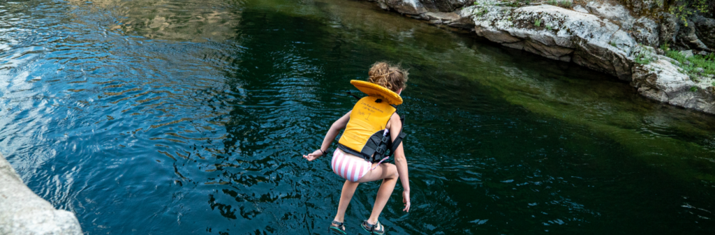 Cliff jumping into warm water on the Salmon